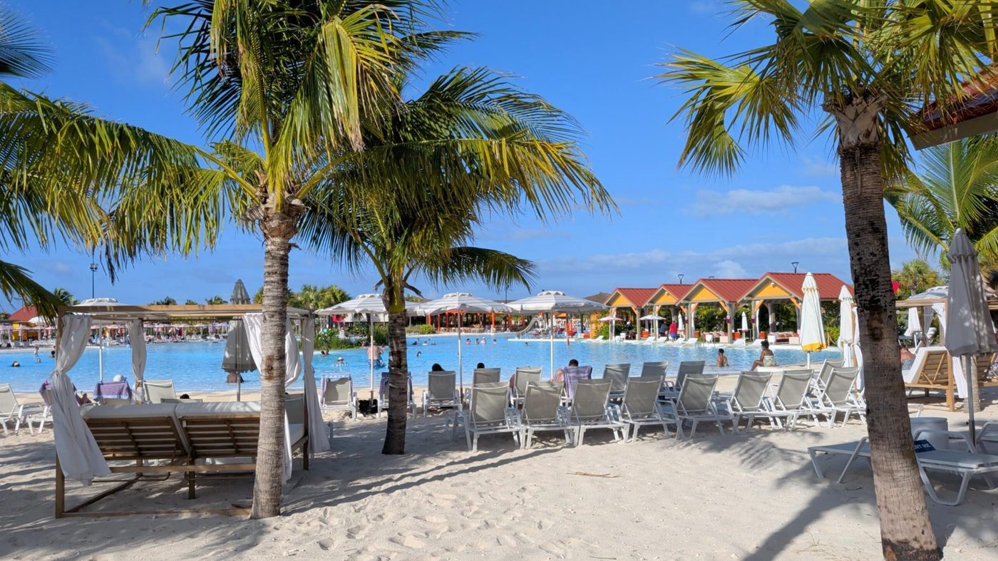 A lagoon with loungers and cabanas at Celebration Key