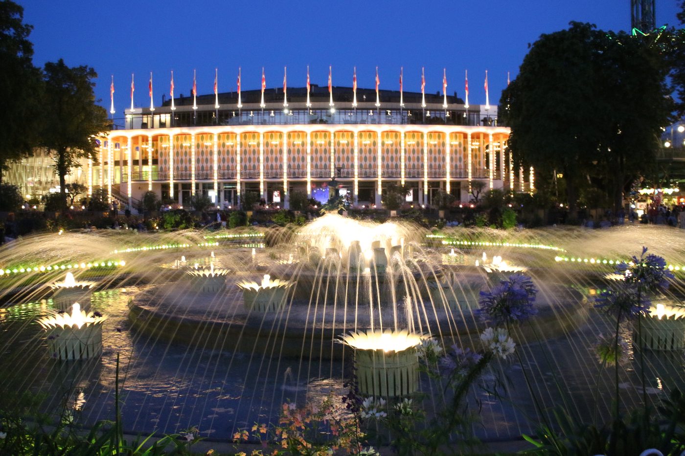 The Tivoli concert hall and fountain at dusk