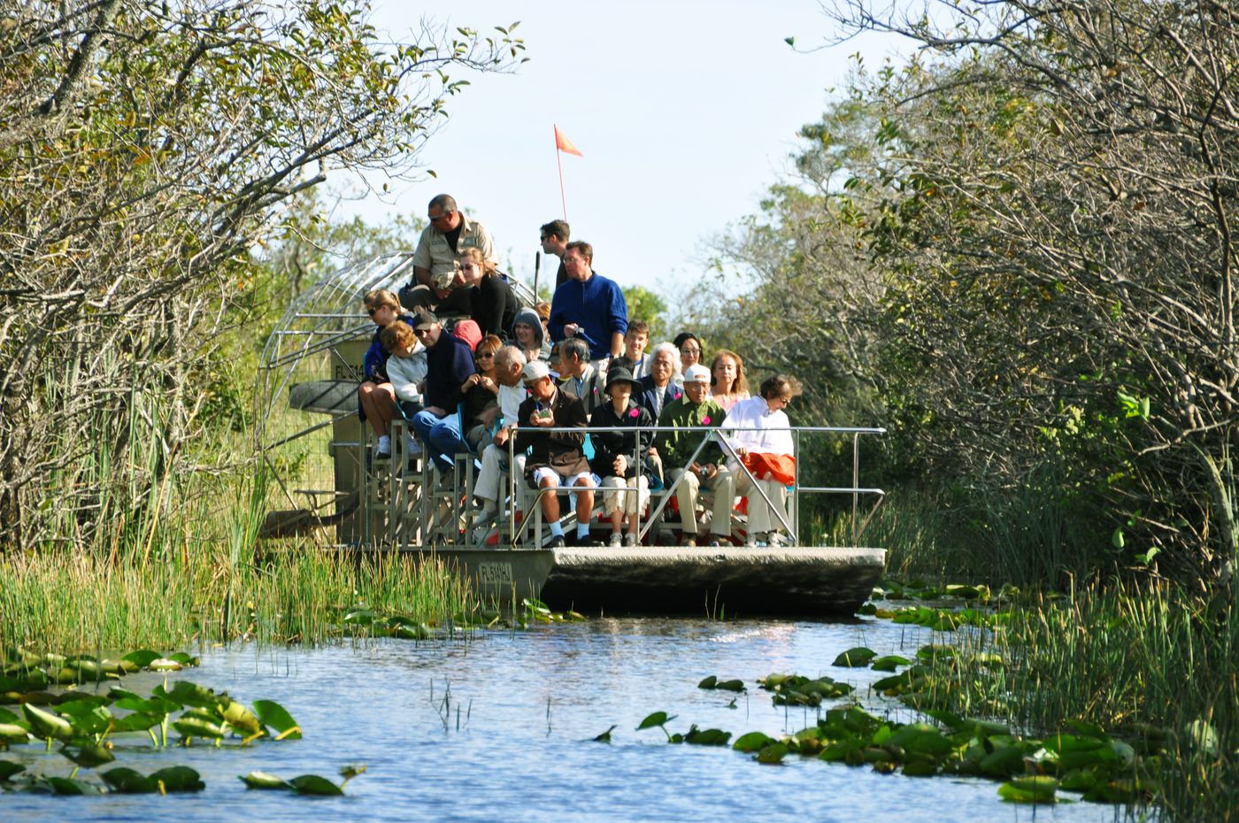 Passengers on an Everglades airboat run by another operator, not Everglades Holiday Park