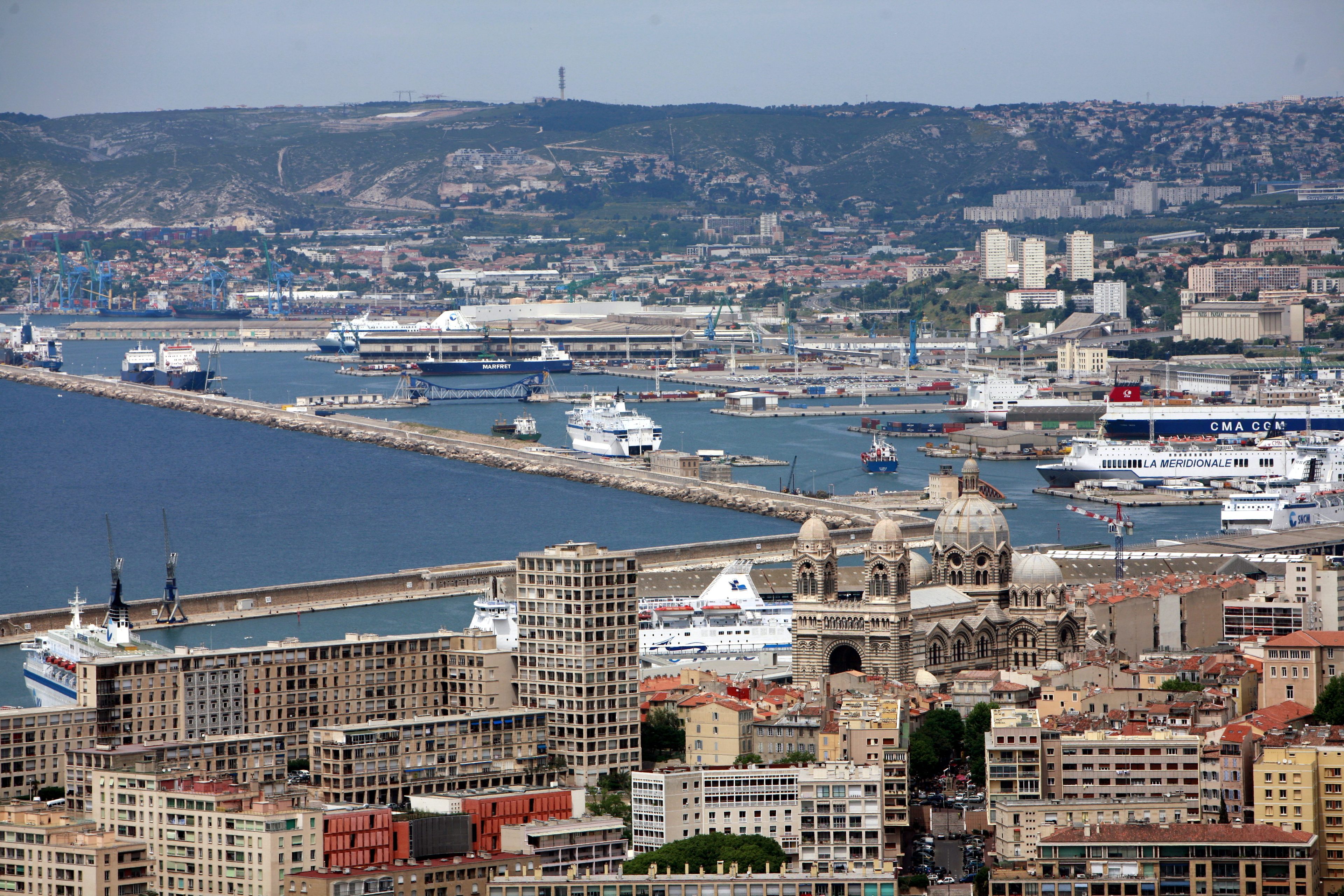Marseille harbor and its ferry and cruise quays, with the Cathédrale de la Major in front