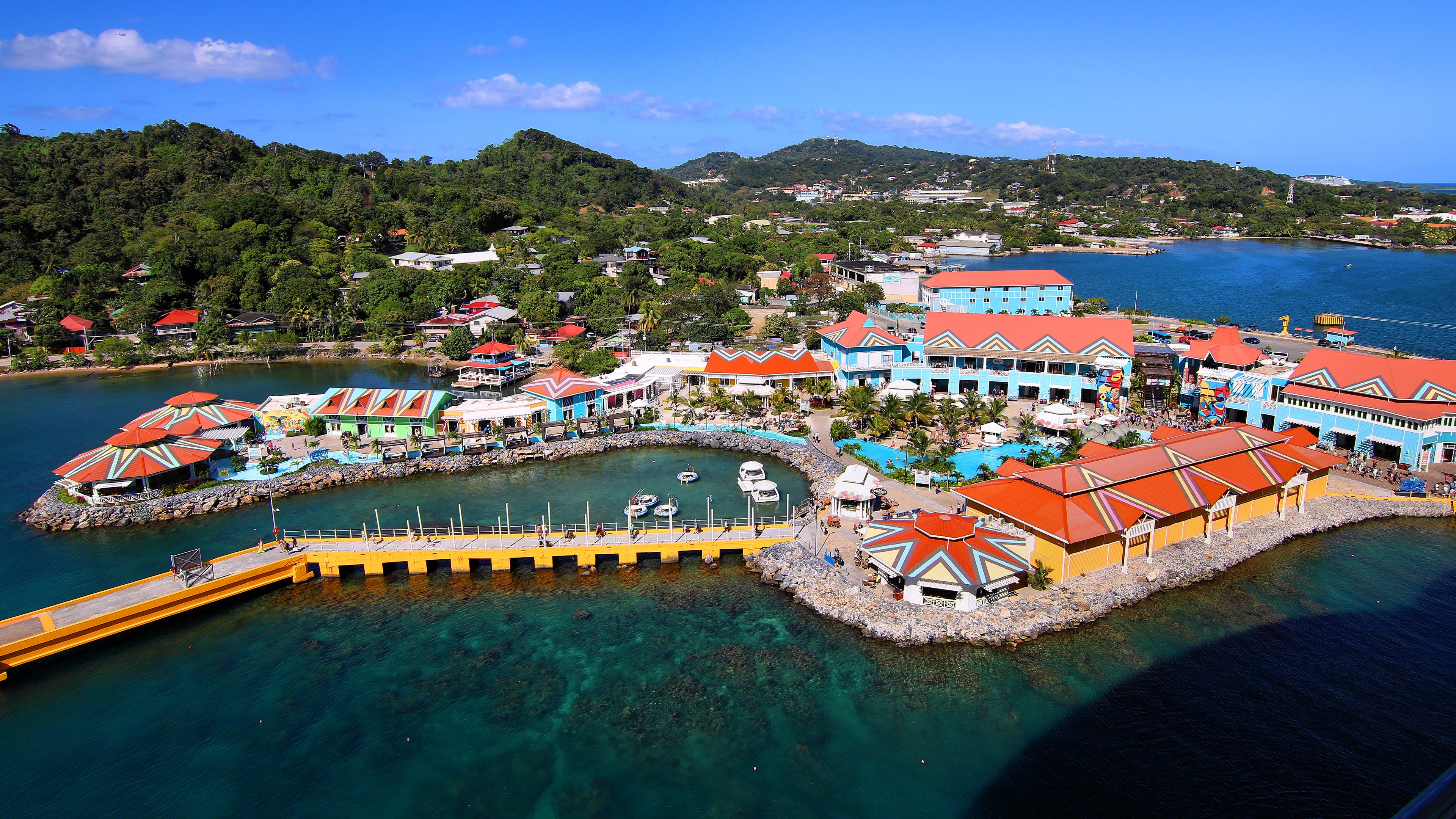 The Port of Roatan and Coxen Hole from the air, with reef water beside the pier