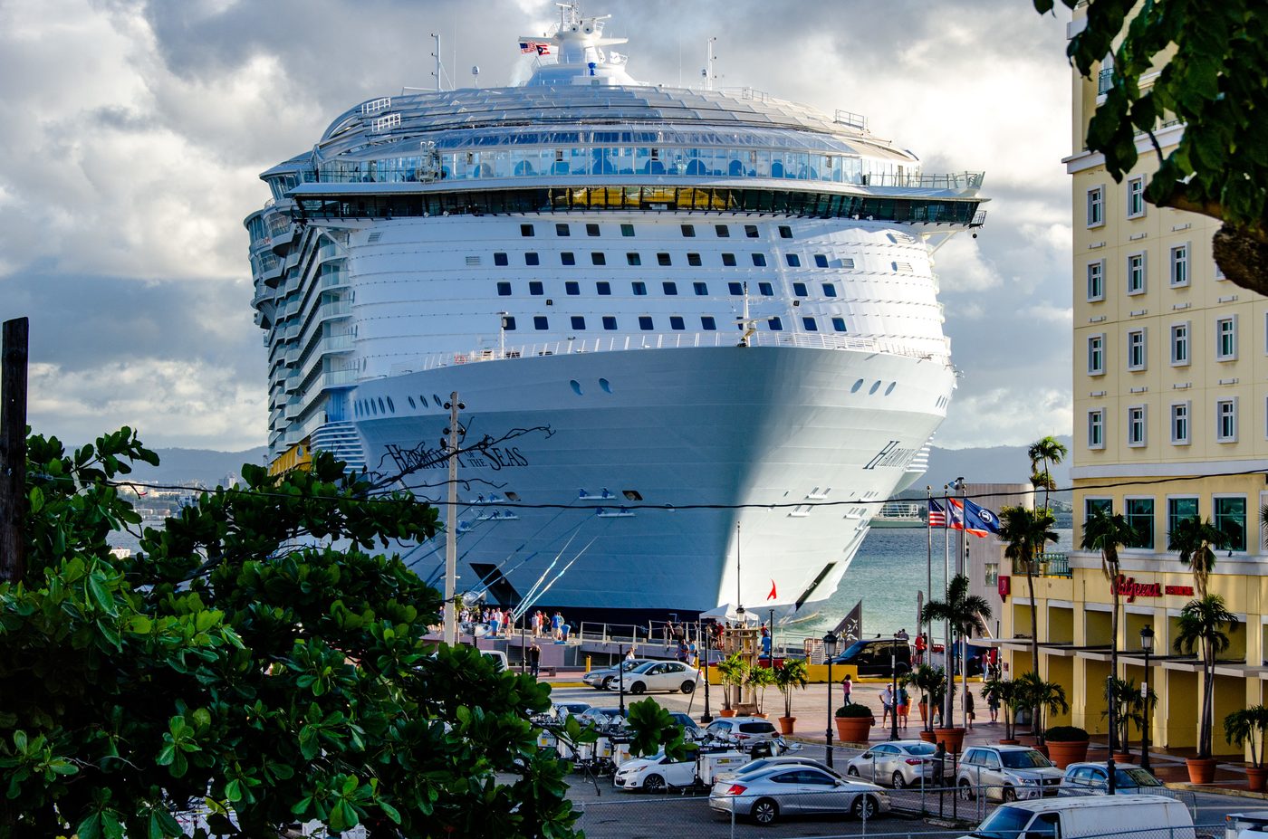 Harmony of the Seas docked at San Juan with Old San Juan behind it